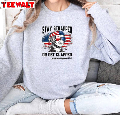 Awesome Fourth Of July Unisex Hoodie, Trendy Stay Strapped Or Get Clapped Shirt Sweater